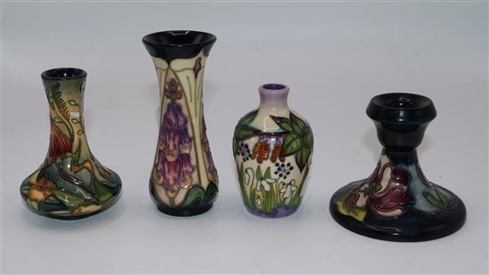 A group of 3 Moorcroft floral small vases and a candlestick